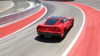 Red 2014 Corvette Stingray on Track
