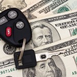 A set of car keys with cash, car payment, $500 discount